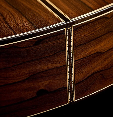 The back binding and purflings at the foot of a 2025 Valerio Licari "Lesna - Special Edition" classical guitar made of spruce and ziricote