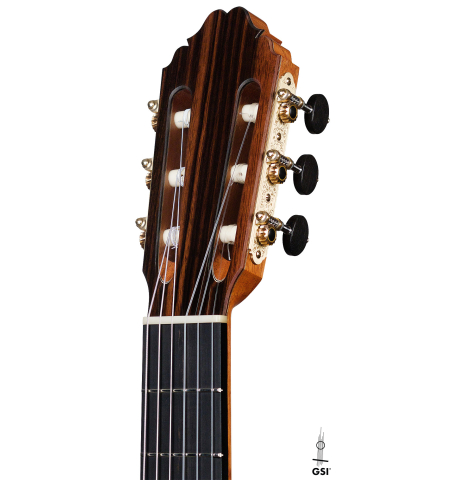 The headstock of a 2021 Bertrand Ligier classical guitar made of cedar and Indian rosewood