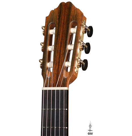 The headstock of a 2021 Bertrand Ligier classical guitar made of spruce and African rosewood