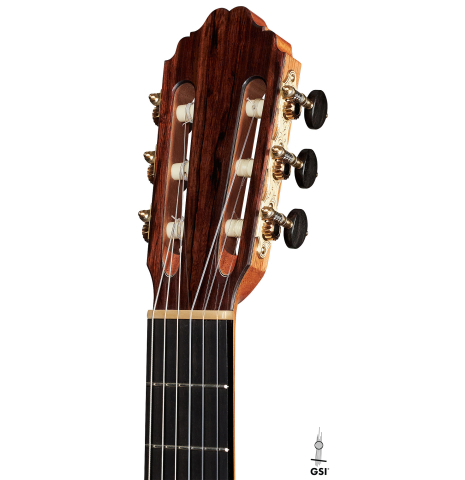 The headstock of a 2023 Bertrand Ligier classical guitar made of spruce and African rosewood