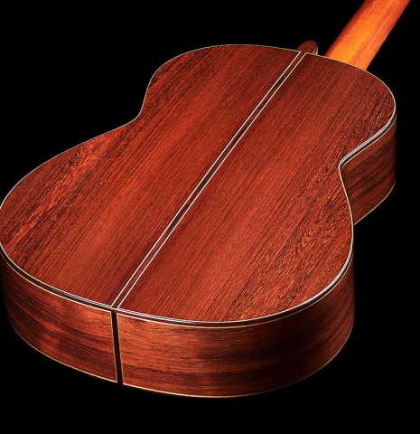 The back and sides at the footof a 2023 Bertrand Ligier classical guitar made of spruce and African rosewood
