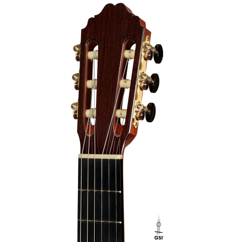 The headstock of a 2023 Bertrand Ligier classical guitar made of spruce and African rosewood