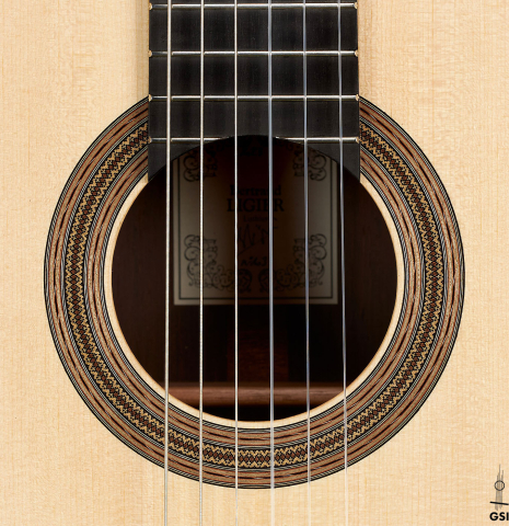 The rosette of a 2023 Bertrand Ligier classical guitar made of spruce and African rosewood