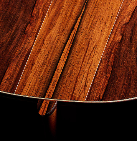 The heel, back binding and purfling of a 2025 Bertrand Ligier classical guitar made of spruce and African rosewood