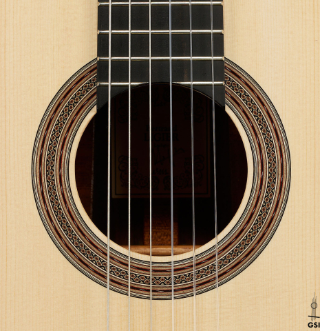 The rosette of a 2025 Bertrand Ligier classical guitar made of spruce and African rosewood