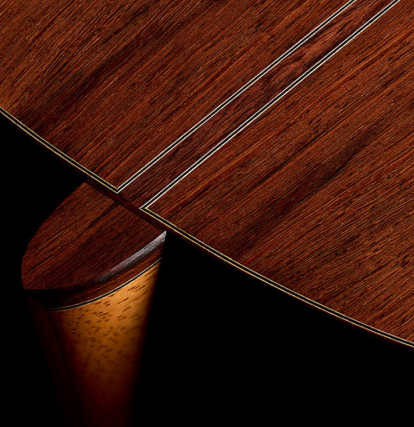The heel, back binding and purfling of a 2026 Bertrand Ligier classical guitar made of spruce and African rosewood