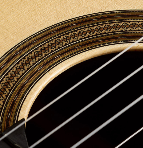 The rosette detailing of a 2026 Bertrand Ligier classical guitar made of spruce and African rosewood
