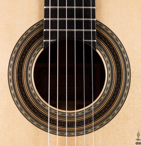 The rosette of a 2021 Luigi Locatto classical guitar made of spruce and CSA rosewood