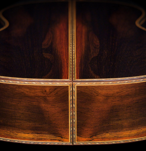 The back and sides and inlay of a 2021 Luigi Locatto classical guitar made of spruce and CSA rosewood