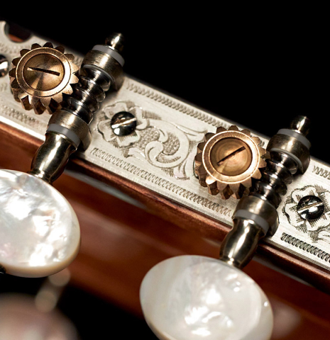 The headstock and machine heads of a 2023 Luigi Locatto classical guitar made of spruce and CSA rosewood
