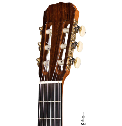 The headstock of a 2006 Luigi Locatto classical guitar made of spruce and Indian rosewood