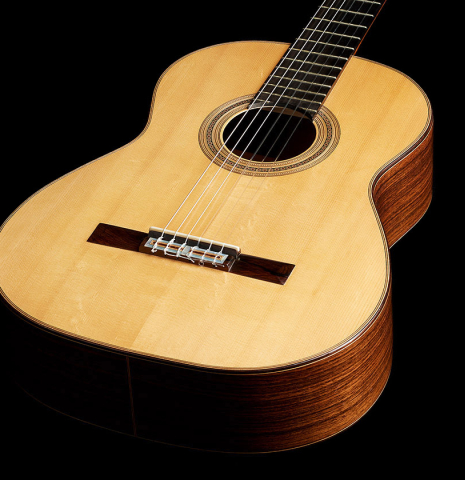 The soundboard and sides of a 2006 Luigi Locatto classical guitar made with spruce and Indian rosewood