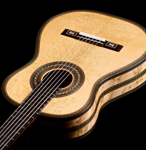 The front of a 2021 Gabriele Lodi &quot;Torres&quot; classical guitar made of spruce and maple.