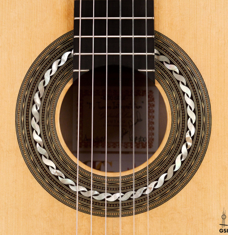 The rosette of a 2021 Gabriele Lodi &quot;Torres&quot; classical guitar made of spruce and maple.