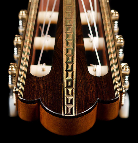A close-up of the headstock inlay of a 2021 Gabriele Lodi "Torres" classical guitar made of spruce and maple.