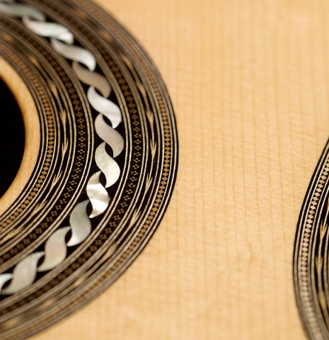 The rosette and inlay of a 2021 Gabriele Lodi "Torres" classical guitar made of spruce and maple.