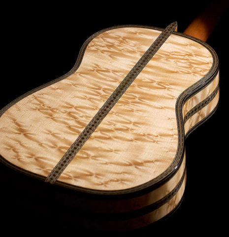 The back of a 2021 Gabriele Lodi "Torres" classical guitar made of spruce and maple.
