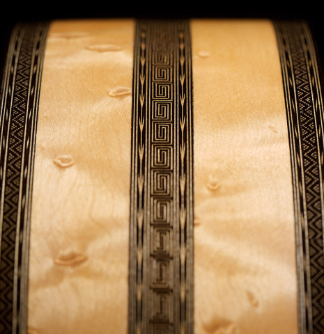 The side inlay of a 2021 Gabriele Lodi &quot;Torres&quot; classical guitar made of spruce and maple.