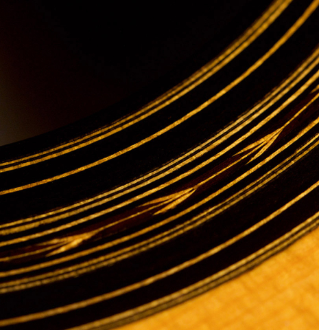 A close-up of the rosette of a 2012 Gabriele Lodi "Enrique Garcia" classical guitar made with spruce and Indian rosewood