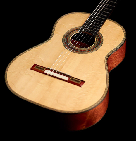 The front of a 2022 Gabriele Lodi &quot;Torres&quot; classical guitar made of spruce and mahogany