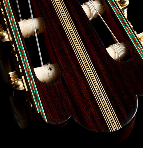 The headstock veneer with inlays and tuning machines of a 2025 Gabriele Lodi "Torres" classical guitar made of spruce and CSA rosewood