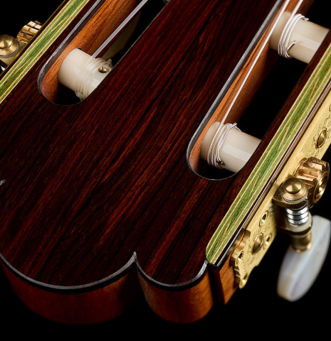 The headstock veneer and tuning machines of a 2020 Gabriele Lodi "Torres" classical guitar made of spruce and CSA rosewood
