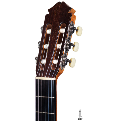 The headstock of a 1965 Marcelino Lopez classical guitar made of spruce and cypress