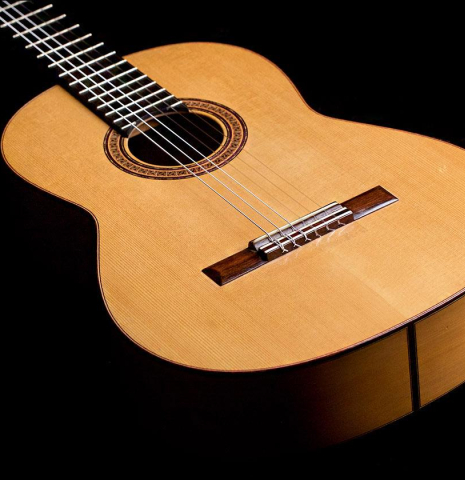 The front of a 1965 Marcelino Lopez classical guitar made of spruce and cypress