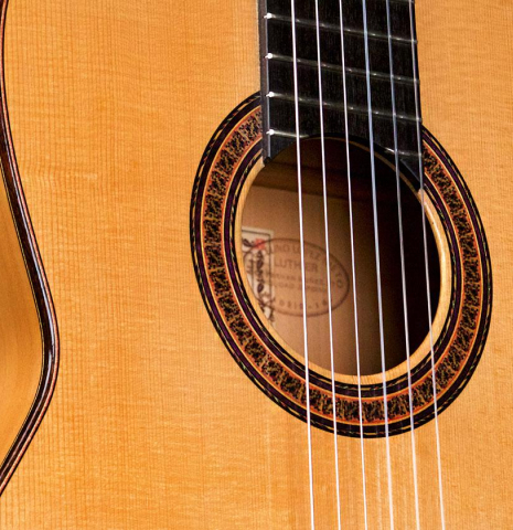 The soundboard and side of a 1965 Marcelino Lopez classical guitar made of spruce and cypress