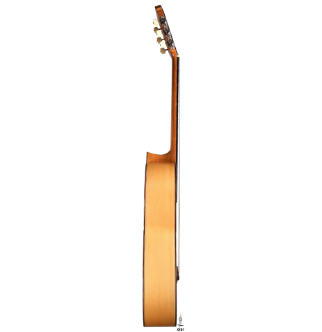 The side of a 1965 Marcelino Lopez classical guitar made of spruce and cypress