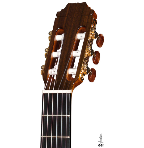 The headstock of a 2021 Hermanos Sanchis Lopez "Antonio Rey" flamenco guitar made of spruce and Indian rosewood