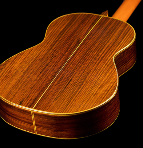 The back and sides of a 2021 Hermanos Sanchis Lopez &quot;Antonio Rey&quot; flamenco guitar made of spruce and Indian rosewood