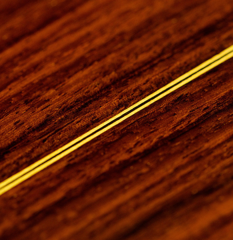 A close-up of the rosette of a 2021 Hermanos Sanchis Lopez "Antonio Rey" flamenco guitar made of spruce and Indian rosewood