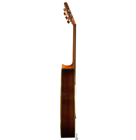 The side of a 2021 Hermanos Sanchis Lopez &quot;Antonio Rey&quot; flamenco guitar made of spruce and Indian rosewood