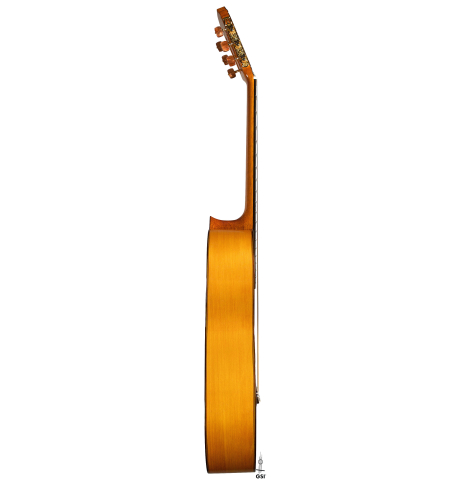 The side of a 2022 Hermanos Sanchis Lopez "Antonio Rey" flamenco guitar made with spruce and cypress