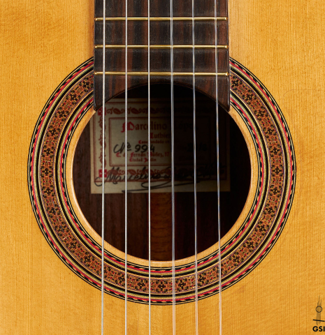 The rosette of a 2012 Marcelino Lopez "1851 Jose Pernas" classical guitar made of spruce and Indian rosewood