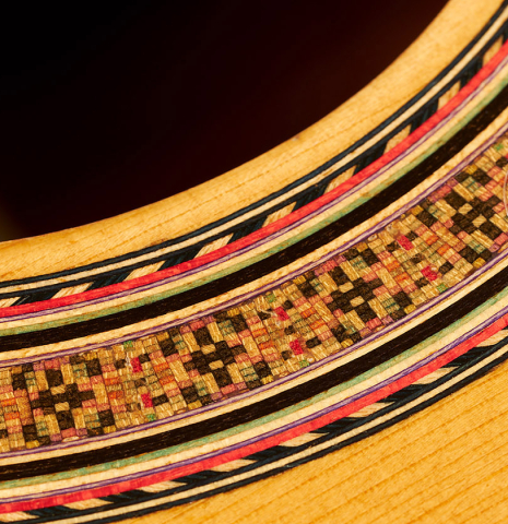 Detail of the rosette of a 2012 Marcelino Lopez "1851 Jose Pernas" classical guitar made of spruce and Indian rosewood