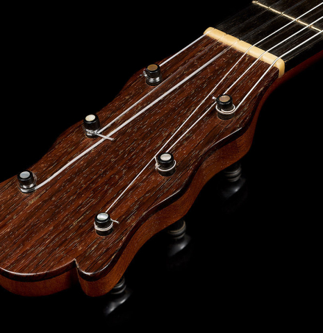 The headstock and tuning pegs of a 1989 Marcelino Lopez "1899 Salvador Ibáñez" classical guitar made of spruce and Indian rosewood