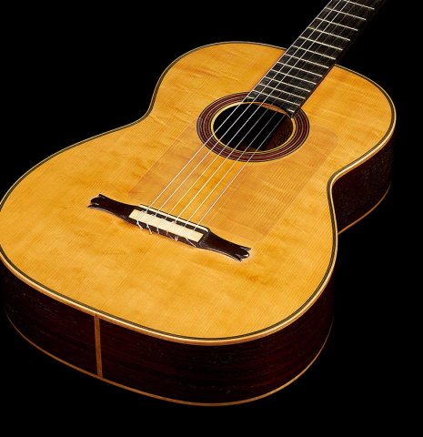 The soundboard and sides of a 1989 Marcelino Lopez "1899 Salvador Ibáñez" classical guitar made of spruce and Indian rosewood