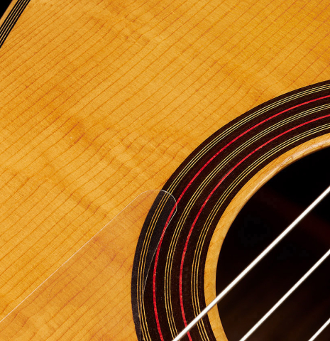 Closeup of the top and rosette of a 1989 Marcelino Lopez "1899 Salvador Ibáñez" classical guitar made of spruce and Indian rosewood