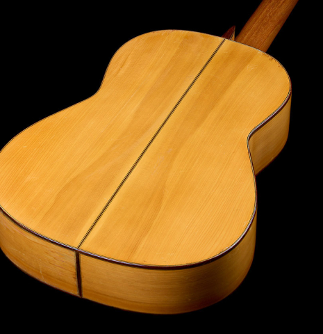 The back and sides of a 1965 Marcelino Lopez classical guitar made of spruce and cypress