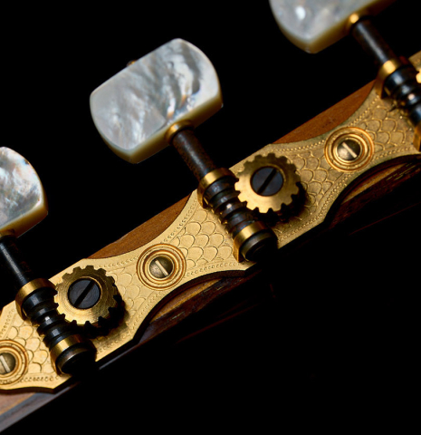 The tuning machines of a 1965 Marcelino Lopez classical guitar made of spruce and cypress