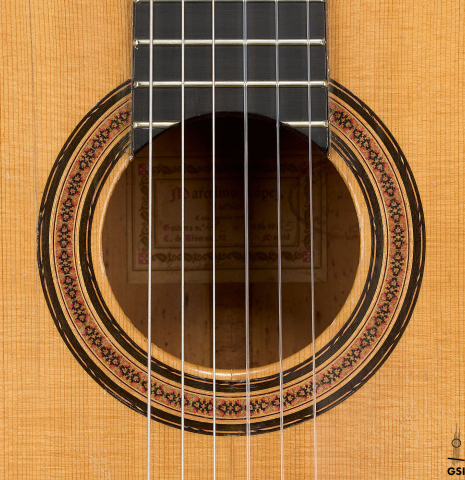 The rosette of a 1965 Marcelino Lopez classical guitar made of spruce and cypress