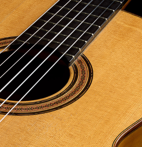 The top, fingerboard and rosette of a 1965 Marcelino Lopez classical guitar made of spruce and cypress