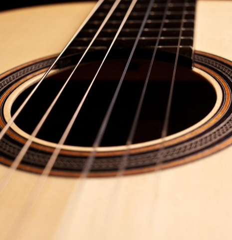 The soundboard of a Loriente &quot;Clarita&quot; classical guitar made of spruce and Indian rosewood.