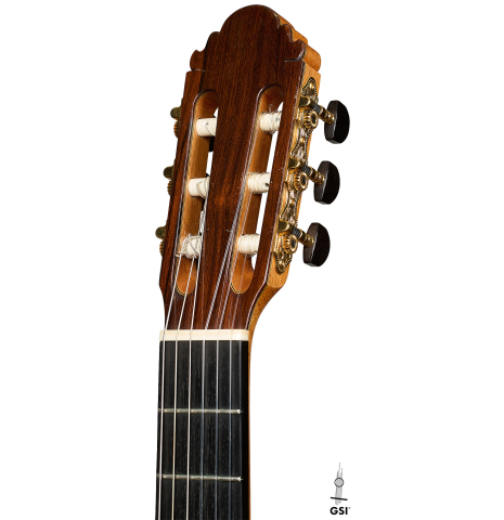 The headstock of a 2009 Casimiro Lozano classical guitar made of spruce and African rosewood