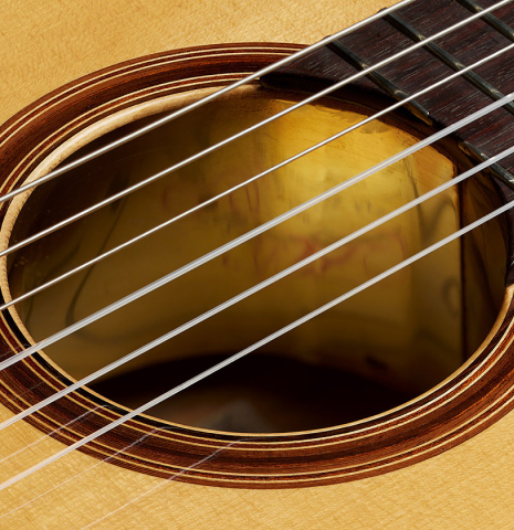 The rosette and tornavoz of a 2025 Darío García "La Leona" classical guitar made of spruce and cypress