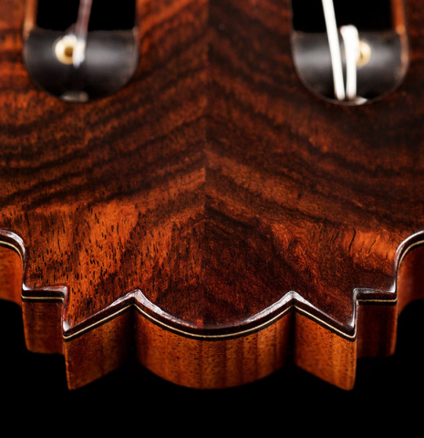 The headstock of a a 2021 Lucas Martin classical guitar made with spruce and Indian rosewood