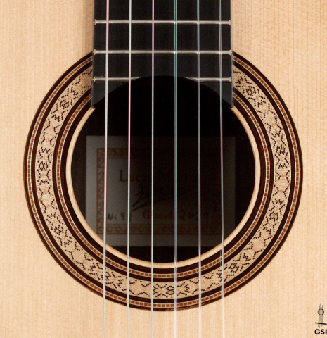The rosette of a 2021 Lucas Martin classical guitar made with spruce and Indian rosewood