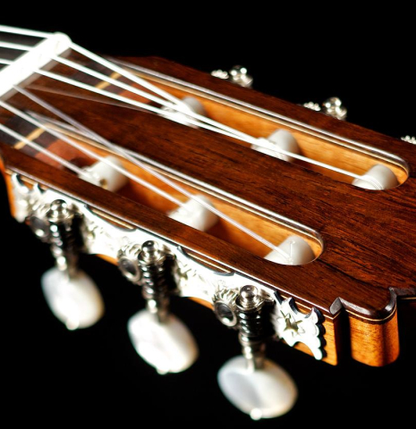 The headstock and tuning machines of a 2012 Bernd Martin classical guitar made of spruce and CSA rosewood